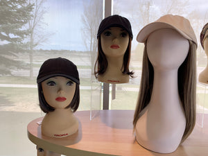 Caps with hair is the perfect wig covering during chemotherapy or radiation therapy.  They look 'normal', natural all the while keeping your cancer and its treatment to yourself. 